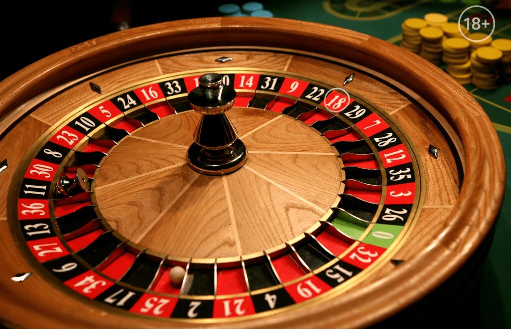 ruletă de casino cu avertisment 18 plus și mesaj despre joc responsabil